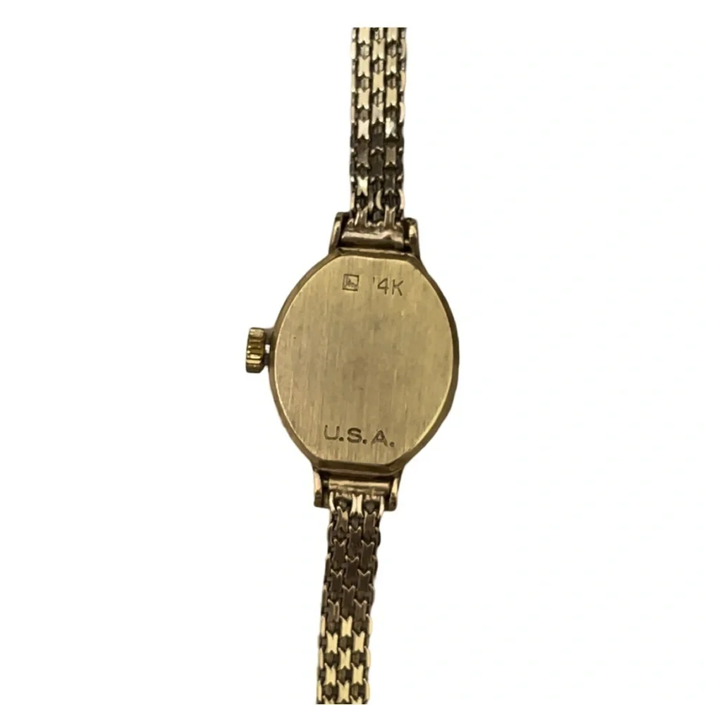 LADIES 14K GOLD GENEVE SWISS QUARTZ WRIST WATCH VINTAGE WOMANS OVAL FACE USA